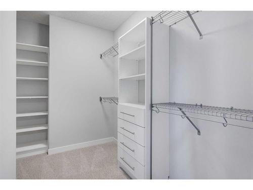 338 Shawnee Boulevard Sw, Calgary, AB - Indoor With Storage