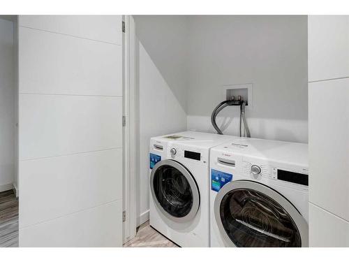 338 Shawnee Boulevard Sw, Calgary, AB - Indoor Photo Showing Laundry Room