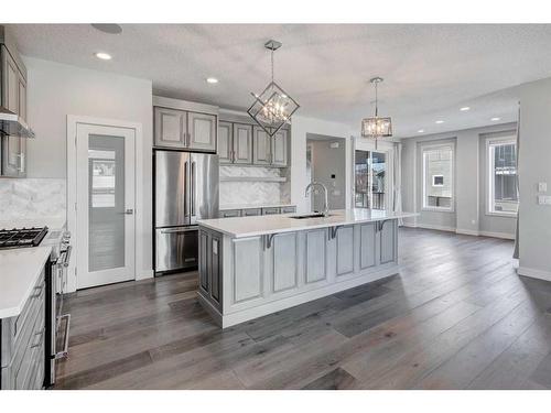 338 Shawnee Boulevard Sw, Calgary, AB - Indoor Photo Showing Kitchen With Stainless Steel Kitchen With Upgraded Kitchen