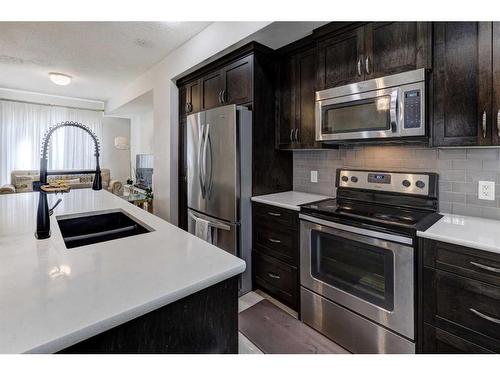 45 Nolanlake Cove Nw, Calgary, AB - Indoor Photo Showing Kitchen With Stainless Steel Kitchen With Double Sink With Upgraded Kitchen