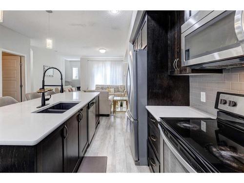 45 Nolanlake Cove Nw, Calgary, AB - Indoor Photo Showing Kitchen With Stainless Steel Kitchen With Double Sink With Upgraded Kitchen