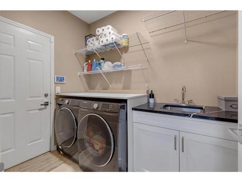 20 Weston Drive Sw, Calgary, AB - Indoor Photo Showing Laundry Room