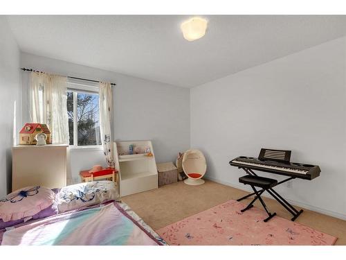 20 Weston Drive Sw, Calgary, AB - Indoor Photo Showing Bedroom