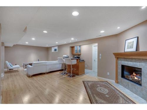 20 Weston Drive Sw, Calgary, AB - Indoor With Fireplace