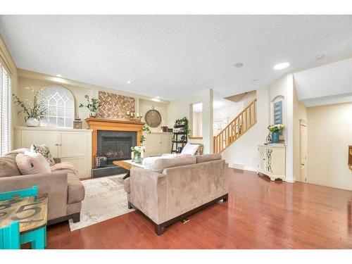 263 Discovery Ridge Boulevard Sw, Calgary, AB - Indoor Photo Showing Living Room With Fireplace