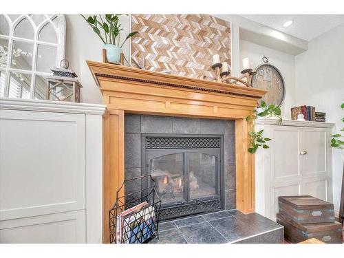 263 Discovery Ridge Boulevard Sw, Calgary, AB - Indoor Photo Showing Other Room With Fireplace