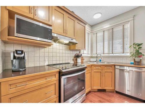 263 Discovery Ridge Boulevard Sw, Calgary, AB - Indoor Photo Showing Kitchen With Stainless Steel Kitchen With Double Sink