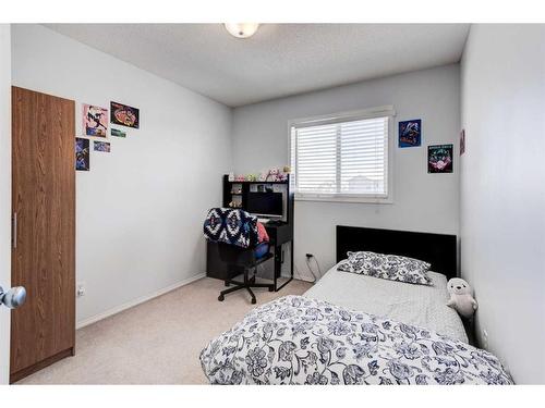 50 Prestwick Rise Se, Calgary, AB - Indoor Photo Showing Bedroom