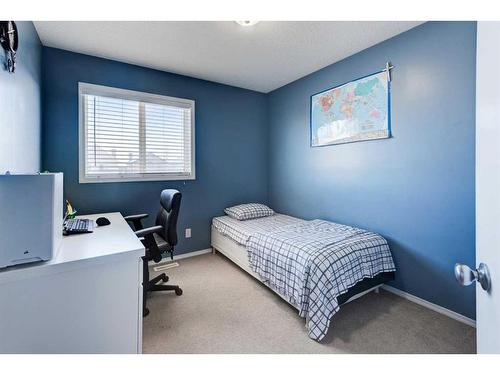 50 Prestwick Rise Se, Calgary, AB - Indoor Photo Showing Bedroom