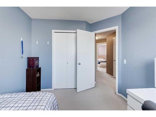 50 Prestwick Rise Se, Calgary, AB - Indoor Photo Showing Bedroom