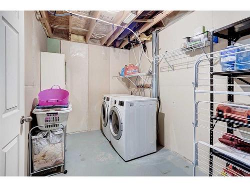 50 Prestwick Rise Se, Calgary, AB - Indoor Photo Showing Laundry Room