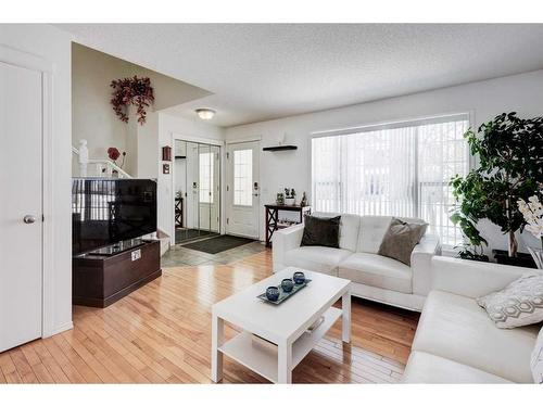 50 Prestwick Rise Se, Calgary, AB - Indoor Photo Showing Living Room