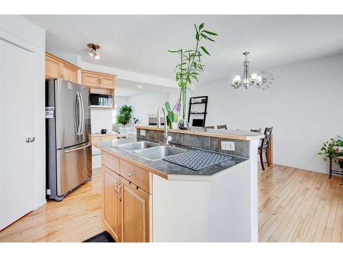 50 Prestwick Rise Se, Calgary, AB - Indoor Photo Showing Kitchen With Stainless Steel Kitchen With Double Sink