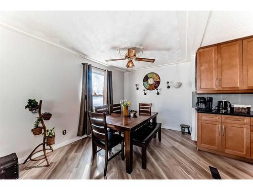 484 Queen Charlotte Road Se, Calgary, AB - Indoor Photo Showing Dining Room