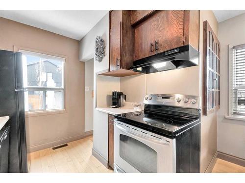 54 St Monica Avenue Se, Calgary, AB - Indoor Photo Showing Kitchen