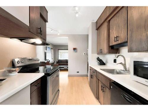 54 St Monica Avenue Se, Calgary, AB - Indoor Photo Showing Kitchen