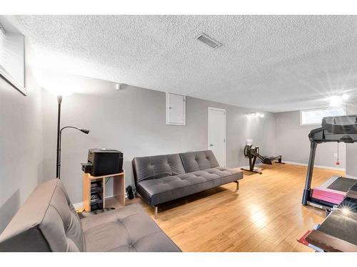 54 St Monica Avenue Se, Calgary, AB - Indoor Photo Showing Gym Room