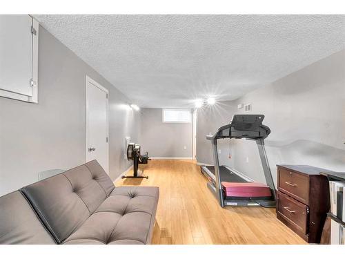 54 St Monica Avenue Se, Calgary, AB - Indoor Photo Showing Gym Room