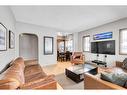 54 St Monica Avenue Se, Calgary, AB  - Indoor Photo Showing Living Room 