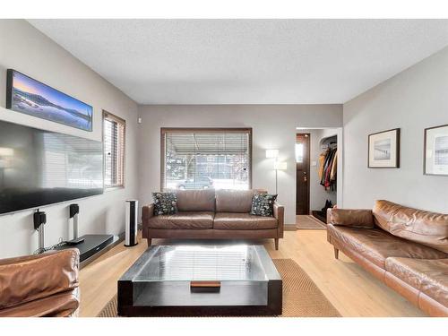 54 St Monica Avenue Se, Calgary, AB - Indoor Photo Showing Living Room