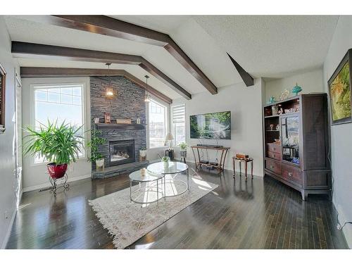 602 Kincora Bay Nw, Calgary, AB - Indoor Photo Showing Living Room With Fireplace