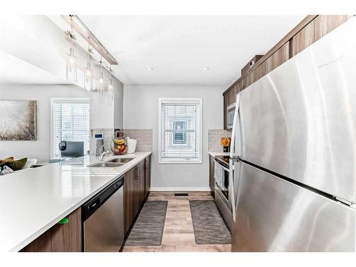 143 Cityscape Row Ne, Calgary, AB - Indoor Photo Showing Kitchen With Double Sink