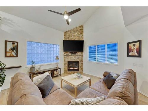 51 Patterson Hill Sw, Calgary, AB - Indoor Photo Showing Living Room With Fireplace