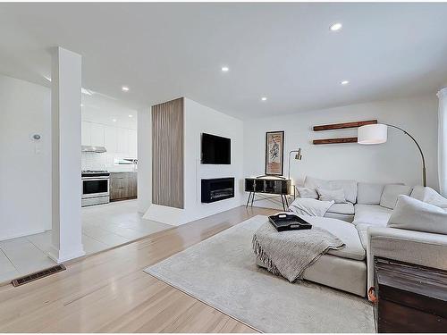 2119 22 Avenue Sw, Calgary, AB - Indoor Photo Showing Living Room With Fireplace