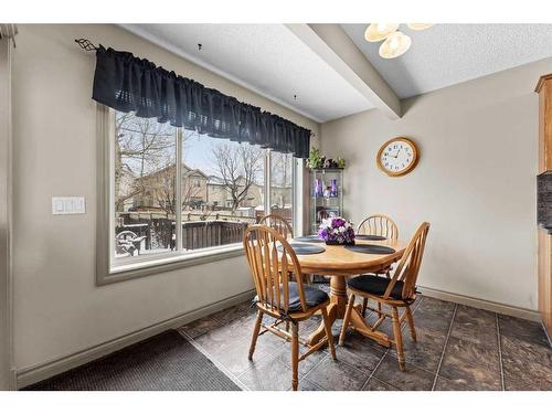 233 Bridlemeadows Common Sw, Calgary, AB - Indoor Photo Showing Dining Room