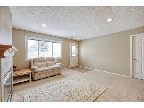 28 Harvest Oak Circle Ne, Calgary, AB - Indoor Photo Showing Other Room With Fireplace