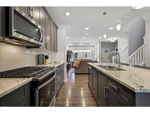 35 Masters Manor Se, Calgary, AB - Indoor Photo Showing Kitchen With Double Sink With Upgraded Kitchen