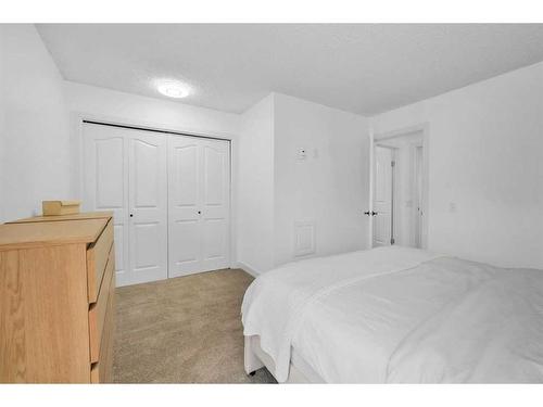 409 Ranchview Court Nw, Calgary, AB - Indoor Photo Showing Bedroom