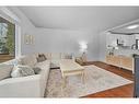 409 Ranchview Court Nw, Calgary, AB  - Indoor Photo Showing Living Room 