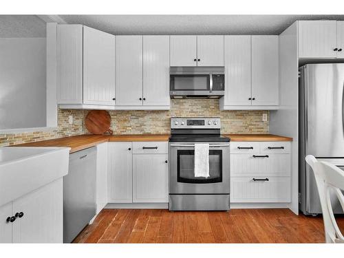 409 Ranchview Court Nw, Calgary, AB - Indoor Photo Showing Kitchen With Stainless Steel Kitchen