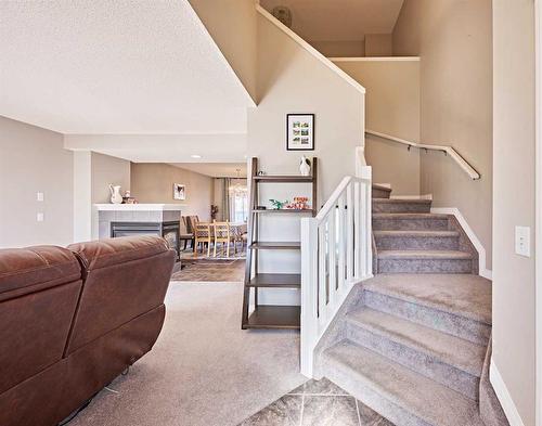 42 Prestwick Place, Calgary, AB - Indoor With Fireplace