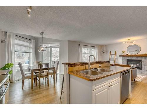 39 Chapalina Way Se, Calgary, AB - Indoor With Fireplace