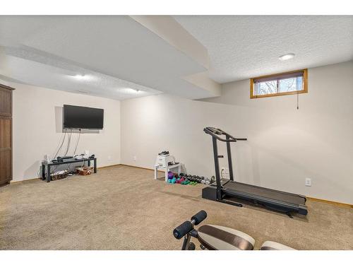 226 Sun Canyon Crescent Se, Calgary, AB - Indoor Photo Showing Gym Room