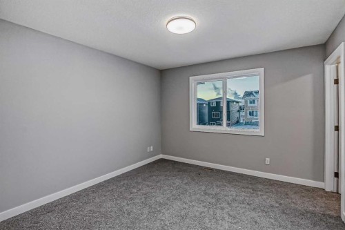 23 Agate Road, Cochrane, AB - Indoor Photo Showing Other Room