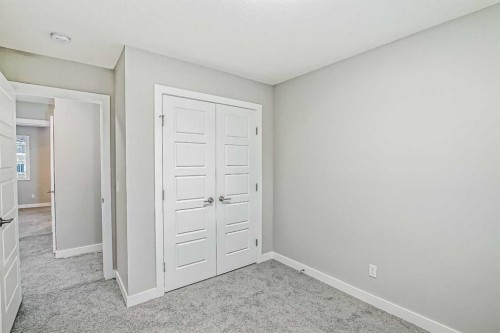 23 Agate Road, Cochrane, AB - Indoor Photo Showing Other Room