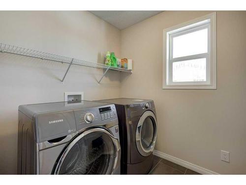 129 Walden Crescent Se, Calgary, AB - Indoor Photo Showing Laundry Room