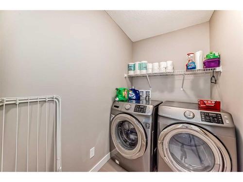 34 Legacy Common Se, Calgary, AB - Indoor Photo Showing Laundry Room