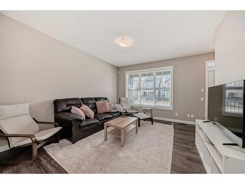 34 Legacy Common Se, Calgary, AB - Indoor Photo Showing Living Room