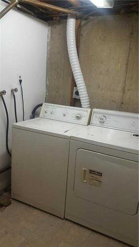 2401 40 Street Se, Calgary, AB - Indoor Photo Showing Laundry Room