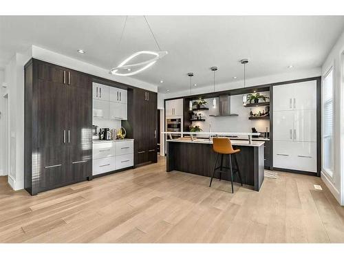 86 West Point Mews Sw, Calgary, AB - Indoor Photo Showing Kitchen With Upgraded Kitchen