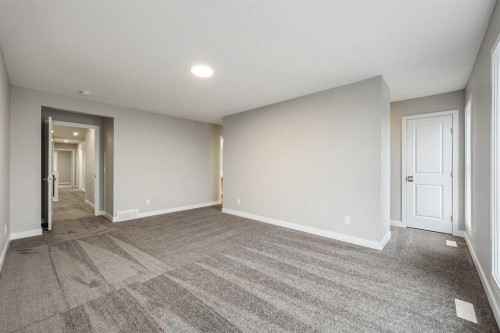 173 Edith Place Nw, Calgary, AB - Indoor Photo Showing Other Room