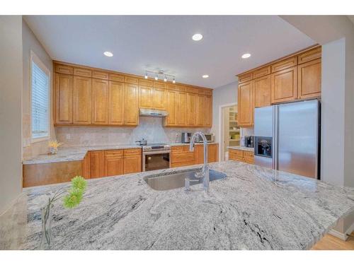 222 Discovery Place Sw, Calgary, AB - Indoor Photo Showing Kitchen With Double Sink