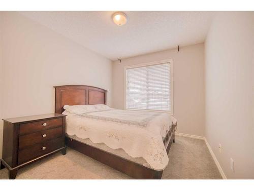 222 Discovery Place Sw, Calgary, AB - Indoor Photo Showing Bedroom