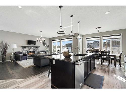 72 Nolanlake View Nw, Calgary, AB - Indoor Photo Showing Kitchen With Fireplace With Upgraded Kitchen