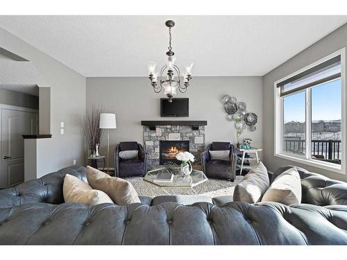 72 Nolanlake View Nw, Calgary, AB - Indoor Photo Showing Living Room With Fireplace