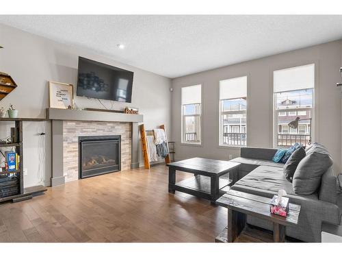 315 Evanston Way Nw, Calgary, AB - Indoor Photo Showing Living Room With Fireplace